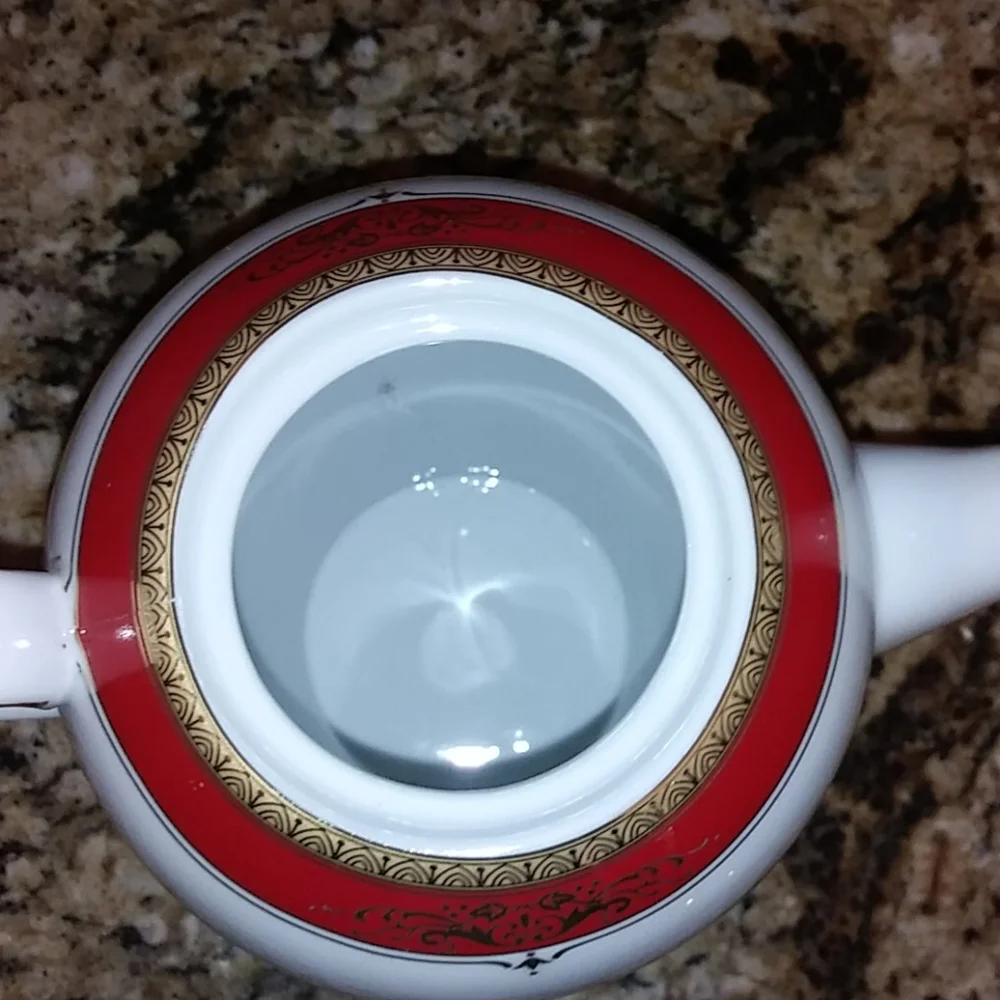 Elegant White Porcelain Teapot with Red and Gold Trim
